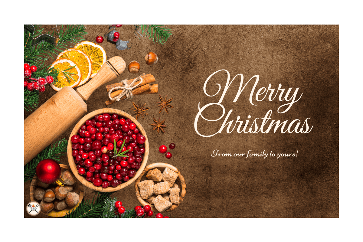 a group of food on a table with the Words Merry Christmas next to it