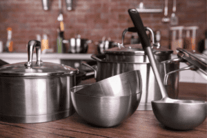 kitchen gear: a group of pots and pans on a table