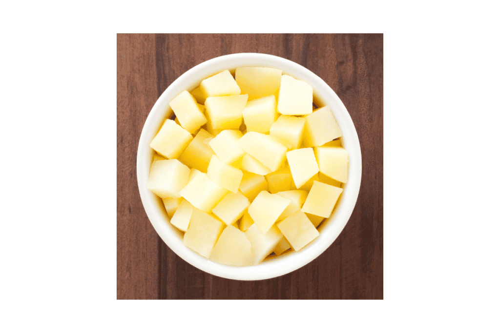 a bowl of diced potatoes